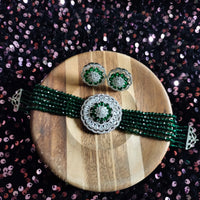 N0506_Classic designer green crystal Grand circular pendant choker necklace set studded  with  American diamond stones.