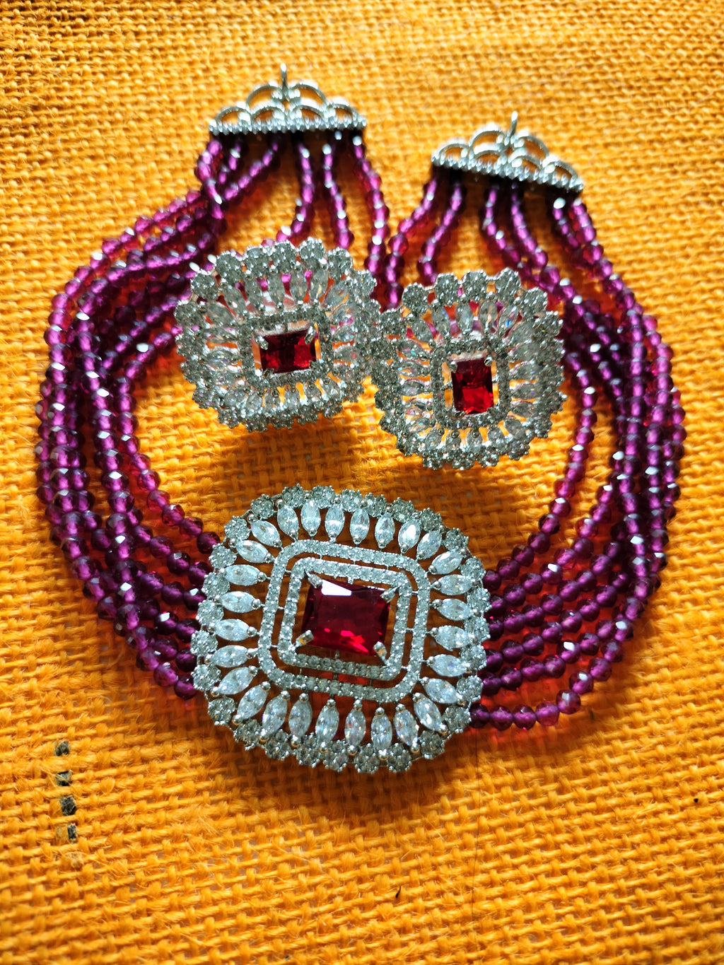 N0509_Classic designer magenta crystal Grand square pendant choker necklace set studded  with  American diamond stones.