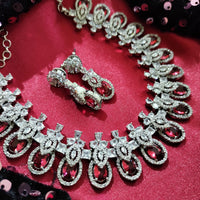 N0514_Gorgeous designer necklace embellished with american diamond stones with a touch of delicate red stone work.