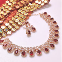 N0543_Lovely rose gold choker necklace embellished with american diamond stones with a touch of  red stones.