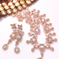 N0542_Elegant flower design choker necklace embellished with american diamond stones with a touch of sea green stones.