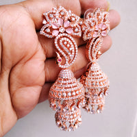 E0869_Ravishing grand layered peacock design rose gold jumkas with delicate stone work.