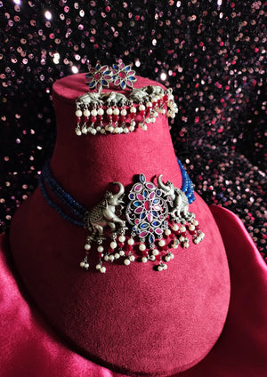 N0157_Exquisite pure German silver Oxidized necklace set studded with blue & pink ruby stones with a touch of blue crystals & pearl drops.