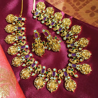 N0555_Traditional temple jewelry style Lakshmi design gold plated necklace set embellished with ruby stones .