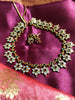 N0554_Elegant temple jewelry style flower design gold plated necklace set embellished with ruby stones .