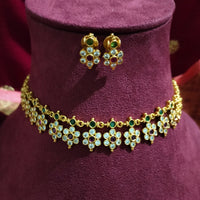 N0554_Elegant temple jewelry style flower design gold plated necklace set embellished with ruby stones .