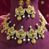 N0556_Classic temple jewelry style Lakshmi design gold plated necklace set embellished with ruby stones with a touch of pearls.