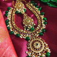 N0551_Grand designer gold plated necklace set embellished with ruby stones with green  bead drops.