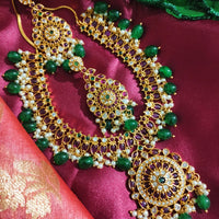 N0551_Grand designer gold plated necklace set embellished with ruby stones with green  bead drops.