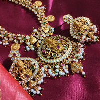 N0552_Grand designer lakshmi design gold plated necklace set embellished with ruby stones with a touch of bead drops.
