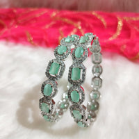 B0315_Elegant silver shade designer American Diamond bangles with a touch of sea green stones.