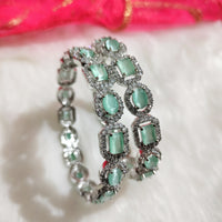 B0315_Elegant silver shade designer American Diamond bangles with a touch of sea green stones.
