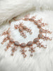 N0552_Lovely designer rose gold choker necklace embellished with american diamond stones with delicate stone work.