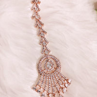 M028_Elegant designer rose gold American diamond studded Maang tika with delicate stone work.