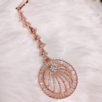 M029_Elegant circular design rose gold American diamond studded Maang tika with delicate stone work.