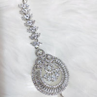 M030_Classy tear drop design American diamond studded Maang tika with delicate stone work.