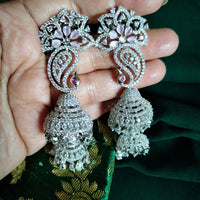 E0874_Ravishing designer American diamond embellished peacock design with a drop of jumka.