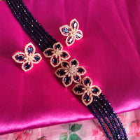 N0569_Classy navy blue crystal flower design choker necklace set studded with American diamond stones.
