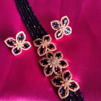N0569_Classy navy blue crystal flower design choker necklace set studded with American diamond stones.