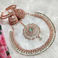 N0574_Elegant designer rose gold american diamond embellished necklace set with a touch of light green colour stones.