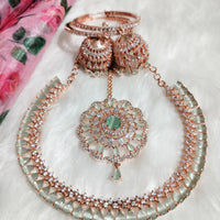 N0574_Elegant designer rose gold american diamond embellished necklace set with a touch of light green colour stones.