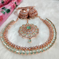 N0574_Elegant designer rose gold american diamond embellished necklace set with a touch of light green colour stones.