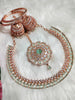 N0574_Elegant designer rose gold american diamond embellished necklace set with a touch of light green colour stones.