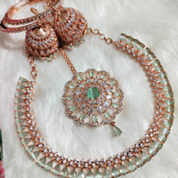 N0574_Elegant designer rose gold american diamond embellished necklace set with a touch of light green colour stones.