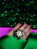R065_Gorgeous flower design American Diamond studded statement ring studded with a touch of green stones.