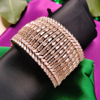 B0317_Grand Designer bracelets studded with delicate work of american diamond stones.