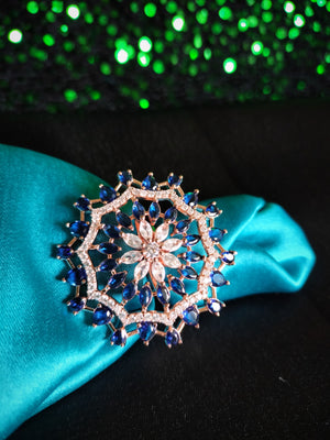 R080_Classic Grand circular design rose gold American Diamond studded statement ring with a touch of blue stones.