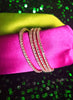 B0317_Elegant sleek design American Diamond bangles with delicate stone work.