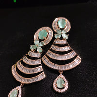 E0879_Lovely rose gold earrings with delicate stone work with a touch of sea green  stones.