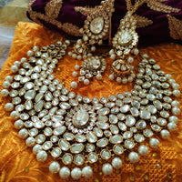 N0584_Royal Bridal style Elaborated choker necklace set studded with Kundan stones with a touch of glossy pearls.