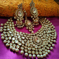 N0584_Royal Bridal style Elaborated choker necklace set studded with Kundan stones with a touch of glossy pearls.