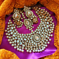 N0584_Royal Bridal style Elaborated choker necklace set studded with Kundan stones with a touch of glossy pearls.