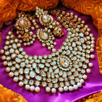 N0584_Royal Bridal style Elaborated choker necklace set studded with Kundan stones with a touch of glossy pearls.