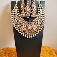 N0584_Royal Bridal style Elaborated choker necklace set studded with Kundan stones with a touch of glossy pearls.