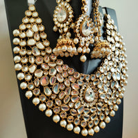 N0584_Royal Bridal style Elaborated choker necklace set studded with Kundan stones with a touch of glossy pearls.