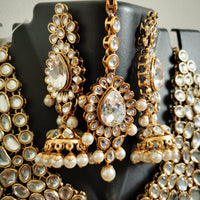 N0584_Royal Bridal style Elaborated choker necklace set studded with Kundan stones with a touch of glossy pearls.