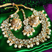 N0585_Royal Bridal style choker necklace set studded with Kundan stones with a touch of glossy pearls.