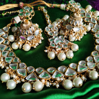 N0585_Royal Bridal style choker necklace set studded with Kundan stones with a touch of glossy pearls.