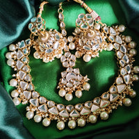 N0585_Royal Bridal style choker necklace set studded with Kundan stones with a touch of glossy pearls.