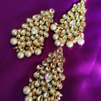 N0588_Royal Bridal style Elaborated choker necklace set studded with Kundan stones with a touch of glossy pearls.