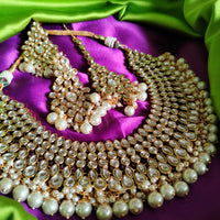 N0588_Royal Bridal style Elaborated choker necklace set studded with Kundan stones with a touch of glossy pearls.