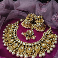 N0591_Royal Bridal style Elaborated choker necklace set studded with Kundan stones with a touch of glossy pearls.
