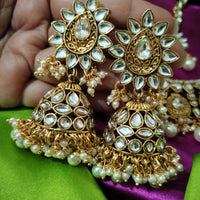 N0591_Royal Bridal style Elaborated choker necklace set studded with Kundan stones with a touch of glossy pearls.