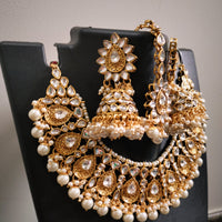 N0591_Royal Bridal style Elaborated choker necklace set studded with Kundan stones with a touch of glossy pearls.