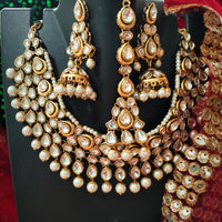 N0592_Royal designer choker necklace set studded with Kundan stones with a touch of glossy pearls.