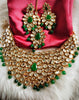 N0594_Royal designer choker necklace set studded with Kundan stones with a touch of glossy green beads.